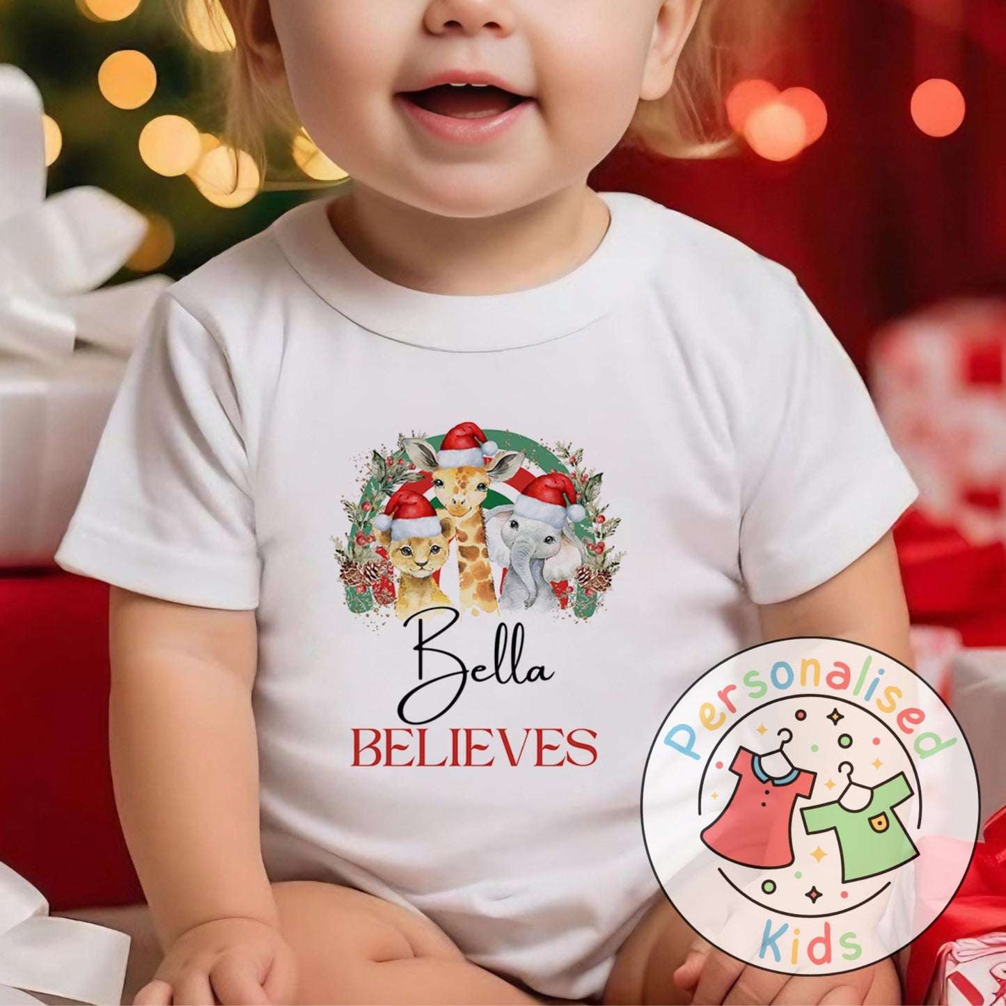 Make this Christmas even more magical with our Personalised Christmas onesie pj – perfect for the whole family! These white cotton bay onsies feature an adorable festive safari animal design, complete with your chosen name and the word "BELIEVES" printed underneath in bold red. Whether you're matching on Christmas morning, heading to a festive event, or capturing the perfect holiday photo, these cosy onsies are the perfect touch of personalised Christmas cheer.