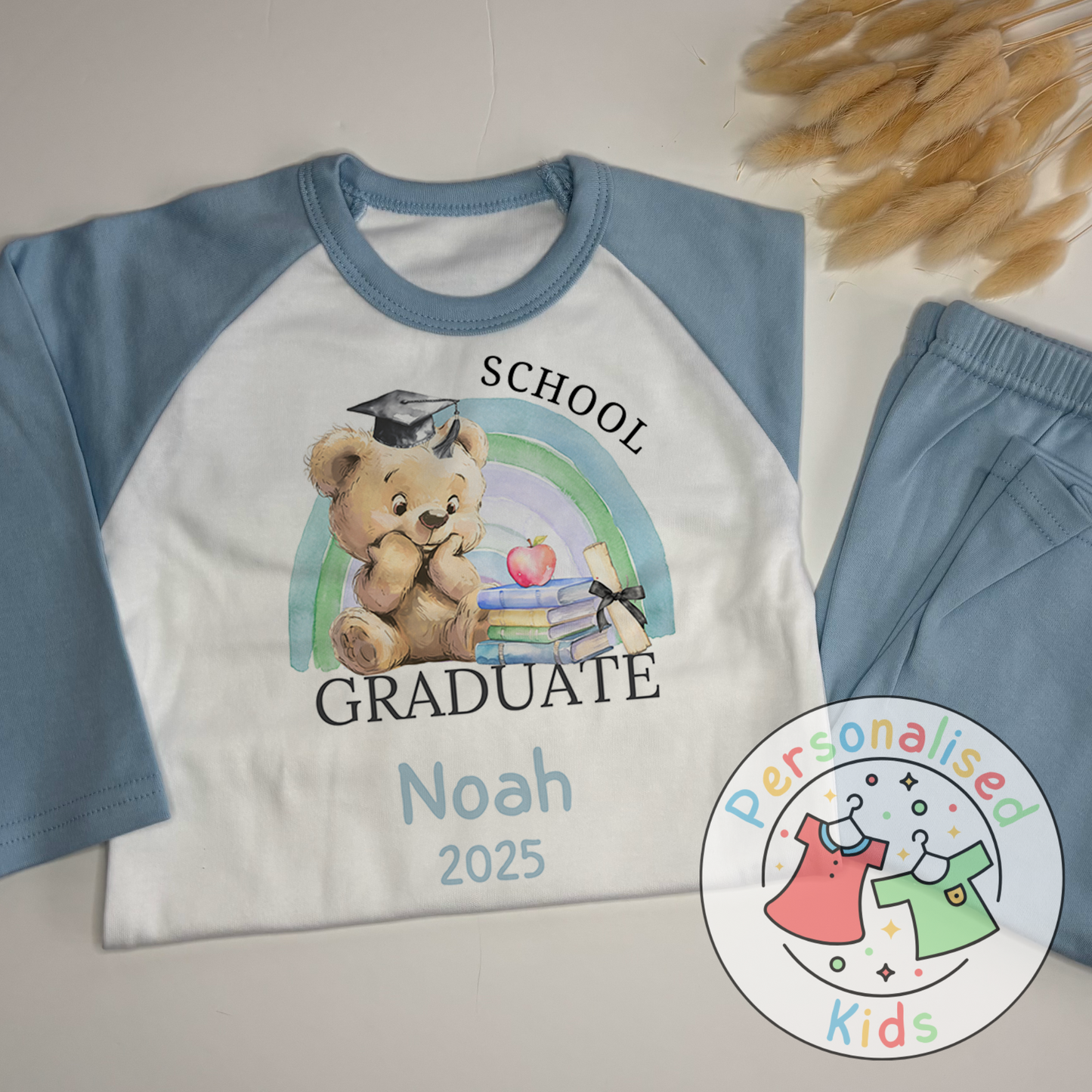Personalised “GRADUATE” Pyjamas – Blue Rainbow & Bear Graduation Design